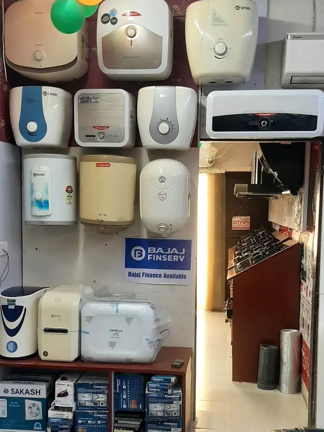 Wall of storage water heaters and water purifiers on brackets